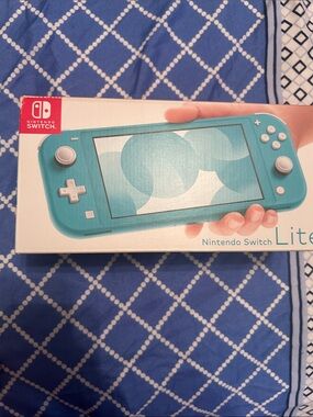 Nintendo Switch Lite Turquoise Handheld Console - Boxed Display